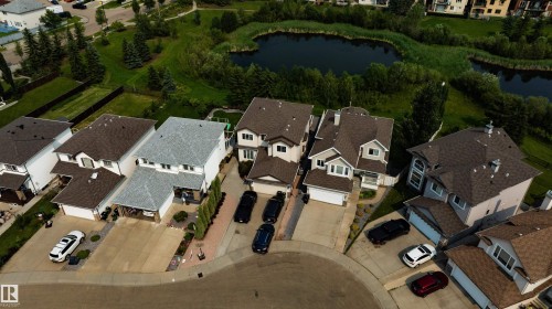 Aerial perspective featuring residential properties with manicured landscaping and paved driveways - 715 Wildwood Point(E) Nw, Edmonton, AB - Outdoor With View