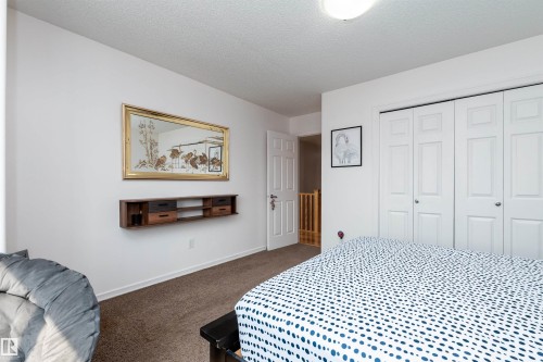 Wall-to-wall carpeting and white walls - 715 Wildwood Point(E) Nw, Edmonton, AB - Indoor Photo Showing Bedroom