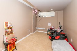 Spacious room featuring neutral carpeting, a single window, and painted walls - 