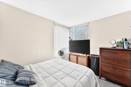 #230 10160 114 St Nw, Edmonton, AB - Indoor Photo Showing Bedroom