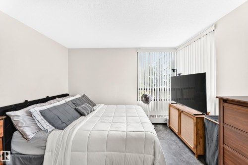 #230 10160 114 St Nw, Edmonton, AB - Indoor Photo Showing Bedroom