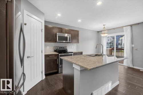 632 42 Avenue Nw, Edmonton, AB - Indoor Photo Showing Kitchen With Stainless Steel Kitchen With Double Sink With Upgraded Kitchen
