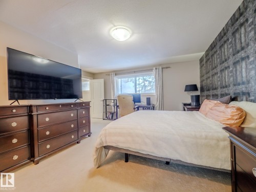 #80 23333 Wye Rd, Rural Strathcona County, AB - Indoor Photo Showing Bedroom