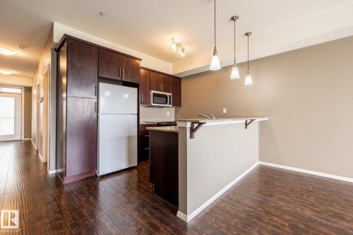 #410 9940 Sherridon Dr, Fort Saskatchewan, AB - Indoor Photo Showing Kitchen