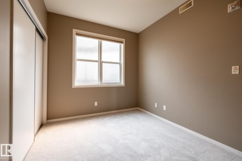 #410 9940 Sherridon Dr, Fort Saskatchewan, AB - Indoor Photo Showing Other Room