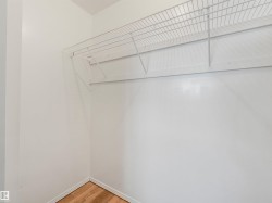 White wire shelving system with a hanging rod - 