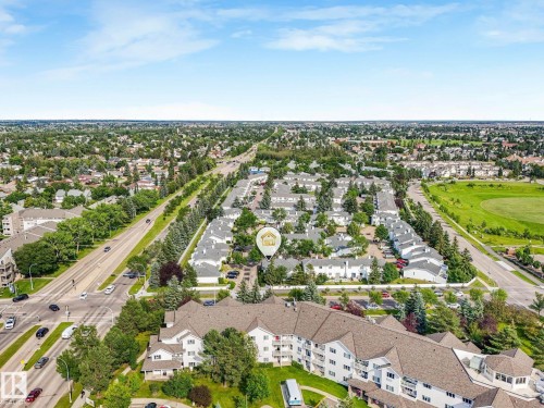 Expansive aerial perspective showcasing a residential community with mature landscaping - #2 3311 58 St Nw, Edmonton, AB - Outdoor With View