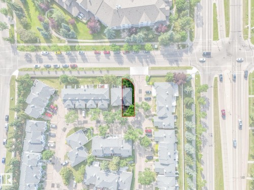 Aerial perspective highlighting a property with mature tree cover and a private driveway - #2 3311 58 St Nw, Edmonton, AB - Other