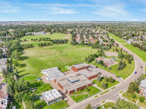 Expansive green spaces featuring manicured lawns and sports fields - #2 3311 58 St Nw, Edmonton, AB - Outdoor With View