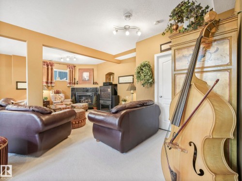 51 Kendall Crescent, St. Albert, AB - Indoor Photo Showing Living Room With Fireplace