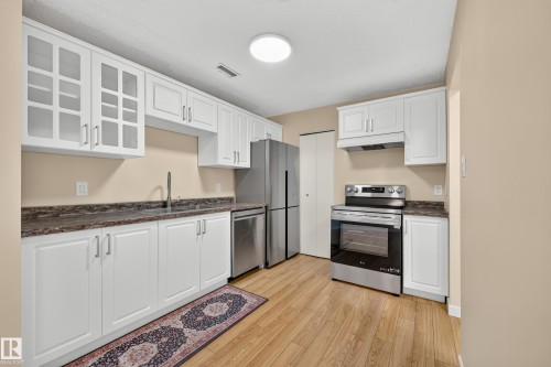 #104 2204 118 St Nw, Edmonton, AB - Indoor Photo Showing Kitchen With Double Sink