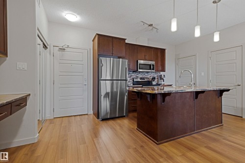 #120 320 Ambleside Link Li Sw, Edmonton, AB - Indoor Photo Showing Kitchen With Double Sink With Upgraded Kitchen