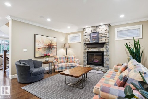 8927 117 Street Nw, Edmonton, AB - Indoor Photo Showing Living Room With Fireplace