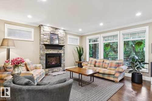 8927 117 Street Nw, Edmonton, AB - Indoor Photo Showing Living Room With Fireplace