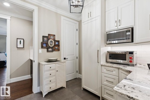 8927 117 Street Nw, Edmonton, AB - Indoor Photo Showing Kitchen