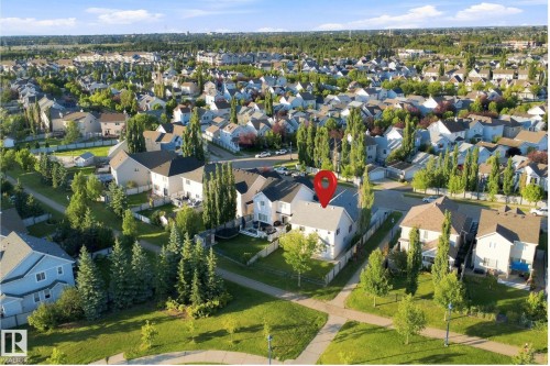 Aerial perspective of a developed residential area with multiple detached homes - 1328 80 Street Sw, Edmonton, AB - Outdoor With View