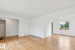 Bright interior space featuring light wood-finish flooring - 