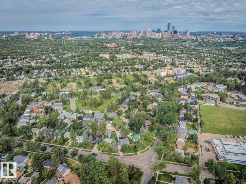 Expansive aerial perspective showcasing a residential neighborhood with a distant cityscape - 8202 93A Avenue Nw, Edmonton, AB - Outdoor With View
