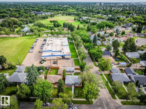 Expansive green spaces and mature tree-lined streets define this residential area - 8202 93A Avenue Nw, Edmonton, AB - Outdoor With View