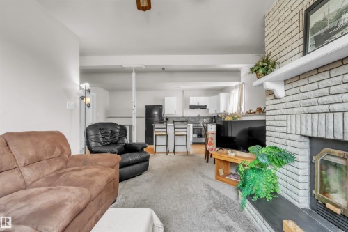 6112 51 Avenue, Cold Lake, AB - Indoor Photo Showing Living Room With Fireplace