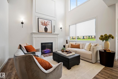 31 Prescott Close, Spruce Grove, AB - Indoor Photo Showing Living Room With Fireplace