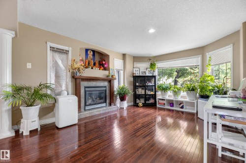 6514 106 Street Nw, Edmonton, AB - Indoor Photo Showing Living Room With Fireplace
