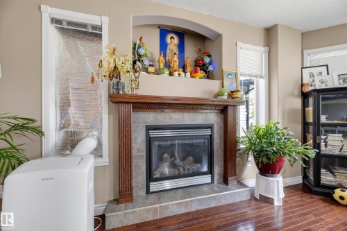 6514 106 Street Nw, Edmonton, AB - Indoor Photo Showing Living Room With Fireplace