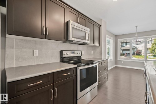 16715 40 Street Nw, Edmonton, AB - Indoor Photo Showing Kitchen With Upgraded Kitchen