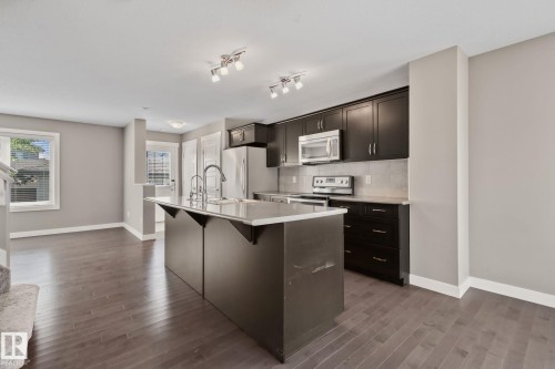 16715 40 Street Nw, Edmonton, AB - Indoor Photo Showing Kitchen With Upgraded Kitchen