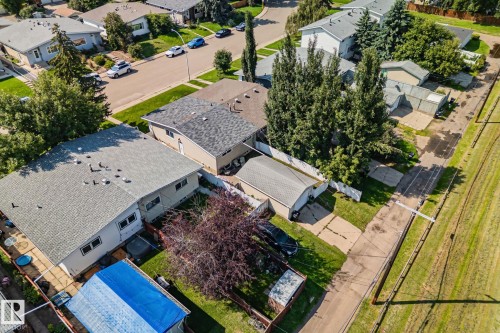 Overhead perspective of a residential property featuring a light-colored shingle roof - 4723 105 Street Nw, Edmonton, AB - Outdoor With View