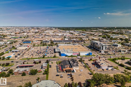 Extensive commercial district featuring multiple retail establishments, large parking areas, and a network of roadways - 4723 105 Street Nw, Edmonton, AB - Outdoor With View