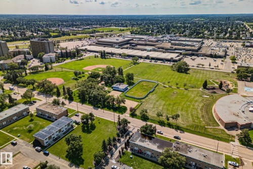Expansive green spaces featuring multiple sports fields and manicured lawns - 4723 105 Street Nw, Edmonton, AB - Outdoor With View