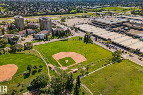 Expansive green space featuring a baseball diamond, walking paths, and mature trees - 4723 105 Street Nw, Edmonton, AB - Outdoor With View