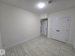 Light-toned tile flooring throughout - 