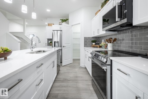 8614 97 Avenue, Morinville, AB - Indoor Photo Showing Kitchen With Double Sink With Upgraded Kitchen