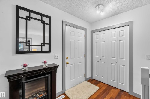 front entrance into living room - 56420 Rge Rd 231, Rural Sturgeon County, AB - Indoor