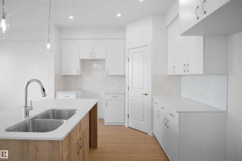 1023 14 Avenue Nw, Edmonton, AB - Indoor Photo Showing Kitchen With Double Sink