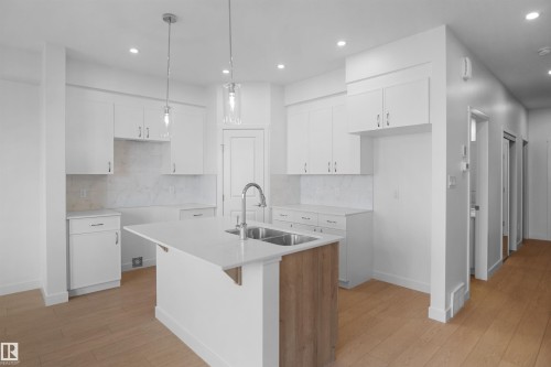 1023 14 Avenue Nw, Edmonton, AB - Indoor Photo Showing Kitchen With Double Sink With Upgraded Kitchen