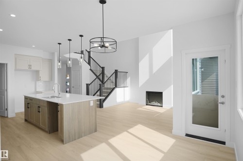 7239 182 Avenue Nw, Edmonton, AB - Indoor Photo Showing Kitchen With Fireplace