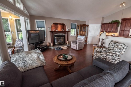 4740 Sunset Drive, Rural Lac Ste. Anne County, AB - Indoor Photo Showing Living Room With Fireplace