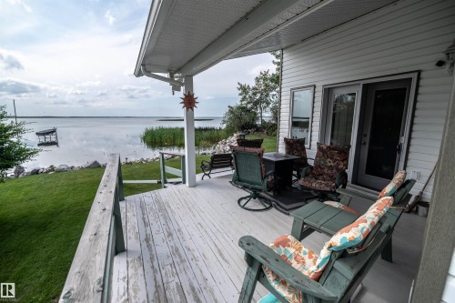 4740 Sunset Drive, Rural Lac Ste. Anne County, AB - Outdoor With Body Of Water With Deck Patio Veranda With Exterior