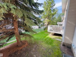 Private outdoor deck with white railing - 
