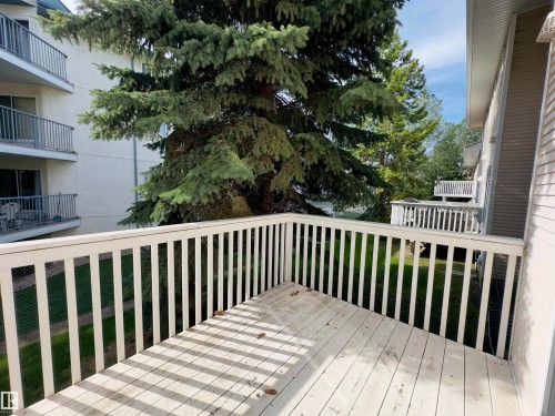 Private balcony with white railing - #48 6608 158 Av Nw, Edmonton, AB - Outdoor With Exterior
