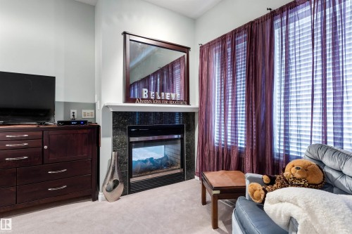 #38 1225 Wanyandi Rd Nw, Edmonton, AB - Indoor With Fireplace