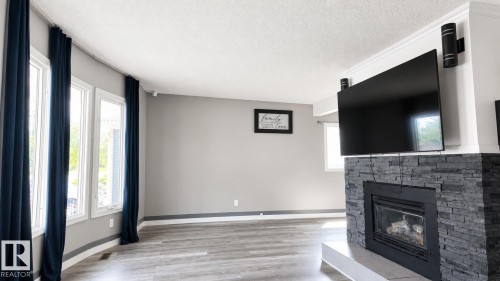 16608 109 Street Nw, Edmonton, AB - Indoor Photo Showing Living Room With Fireplace