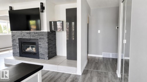 16608 109 Street Nw, Edmonton, AB - Indoor Photo Showing Living Room With Fireplace