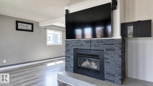 16608 109 Street Nw, Edmonton, AB - Indoor Photo Showing Living Room With Fireplace
