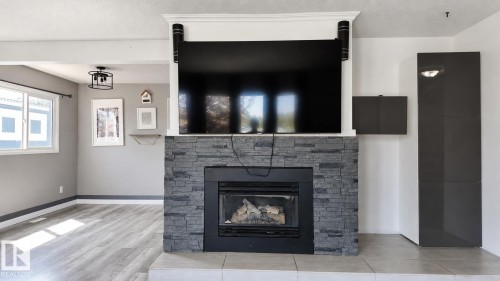 16608 109 Street Nw, Edmonton, AB - Indoor Photo Showing Living Room With Fireplace