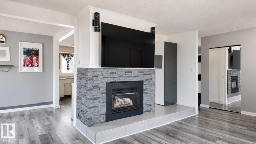 16608 109 Street Nw, Edmonton, AB - Indoor Photo Showing Living Room With Fireplace