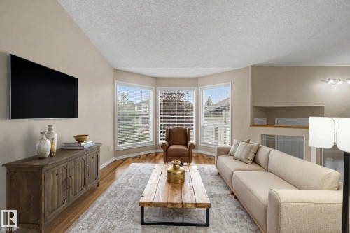 64 Creekside Way, Spruce Grove, AB - Indoor Photo Showing Living Room With Fireplace